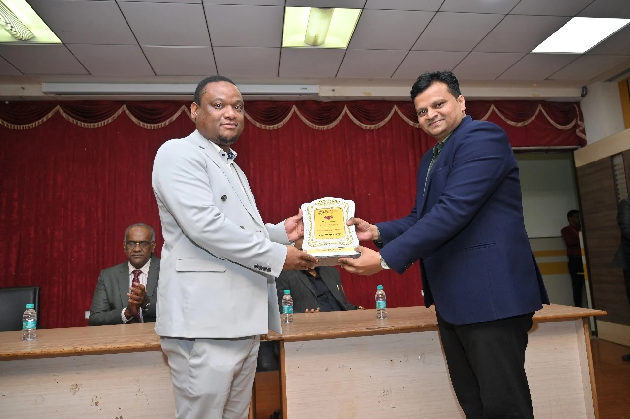 NAC Travel receiving industry recognition during a professional partner event